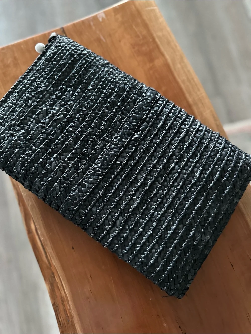 Shiraleah Navy Woven Straw Clutch with White Pom-Pom Trim